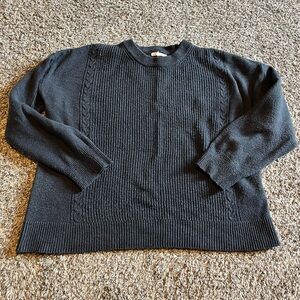 Maurice’s dark blue sweater